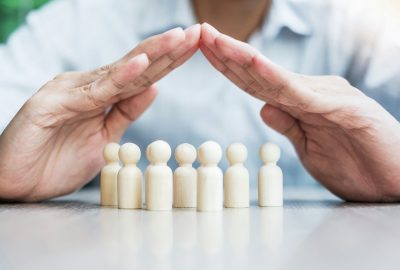 Businessman hand cover man wooden from crowd of employees. People, Business, Human Resources